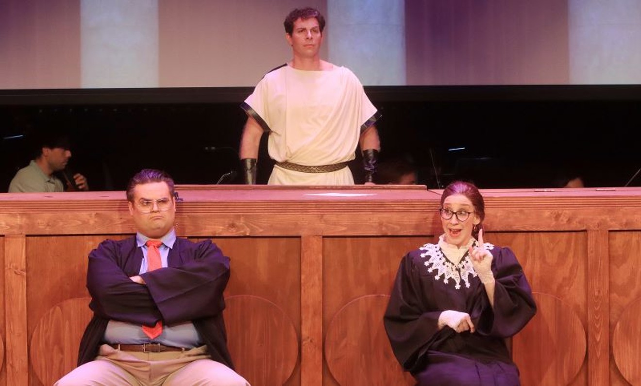 Dane Suarez, tenor, as Justice Antonin Scalia, Sydney Anderson, soprano, as Justice Ruth Bader Ginsburg, and Tyler Putnam, bass-baritone as The Commentator in Derrick Wang's opera, Scalia/Ginsburg.