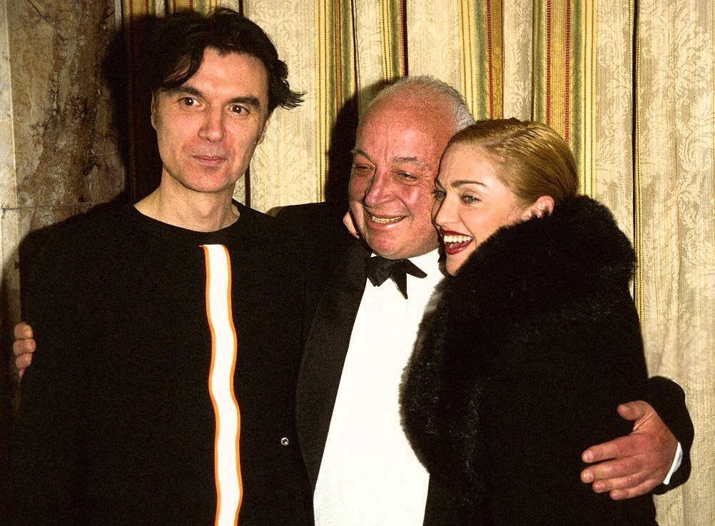 Seymous Stein (center) with David Byrne and Madonna at his induction into the Rock and Roll Hall of Fame.