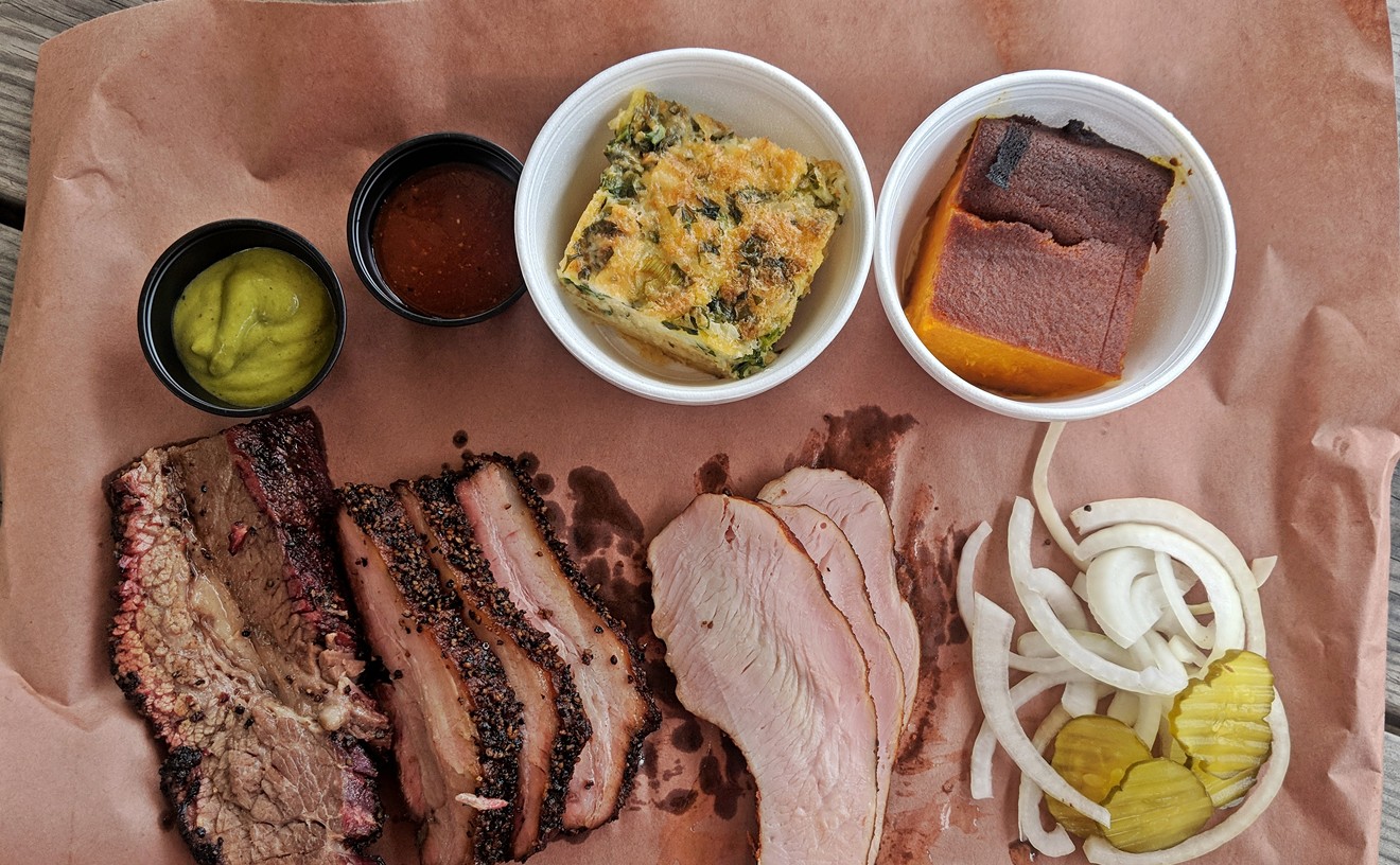 Three meat spread with sides at Tejas Chocolate + Barbecue
