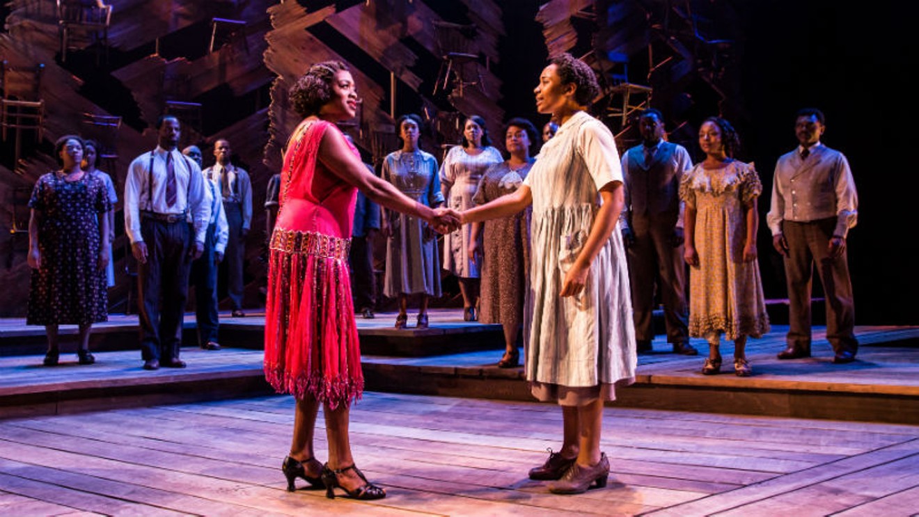 Carla R. Stewart (Shug Avery) and Adrianna Hicks (Celie) and the North American tour cast of The Color Purple. 