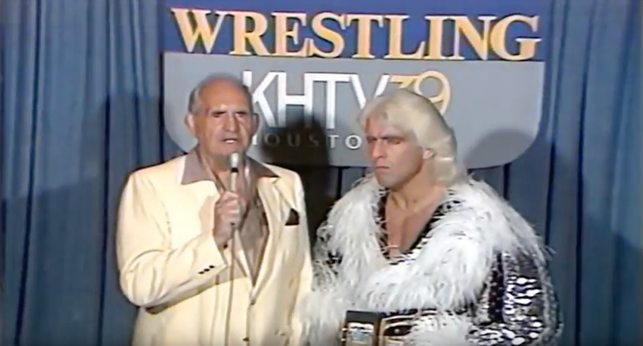 The greatest of all time, Ric Flair, cutting a promo with Paul Boesch here in Houston.
