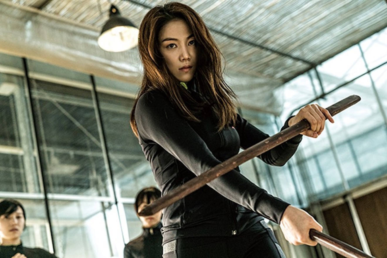 Kim Ok-bin plays Sook-hee, the protagonist who wildly shoots and slashes and stabs her way through corridors at the opening of The Villainess.