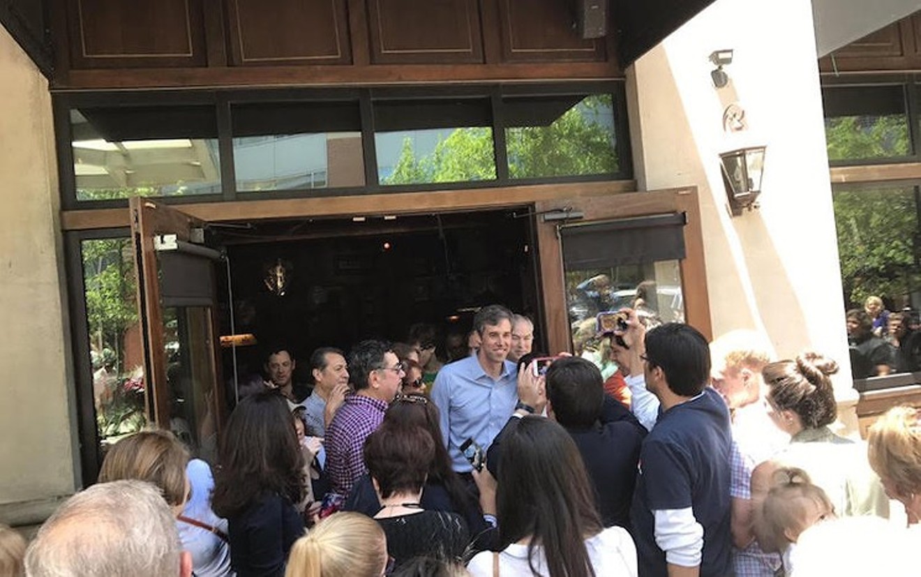 El Paso congressman and U.S. Senate candidate Beto O'Rourke (center, powder-blue shirt) meets some potential constituents at a recent rally in The Woodlands.