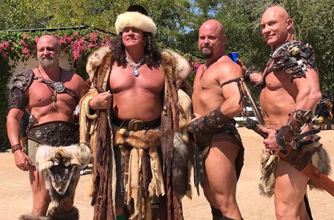 Phil Brayton (second from left) and crew raise the bar on Texas Renaissance Festival barbarians.