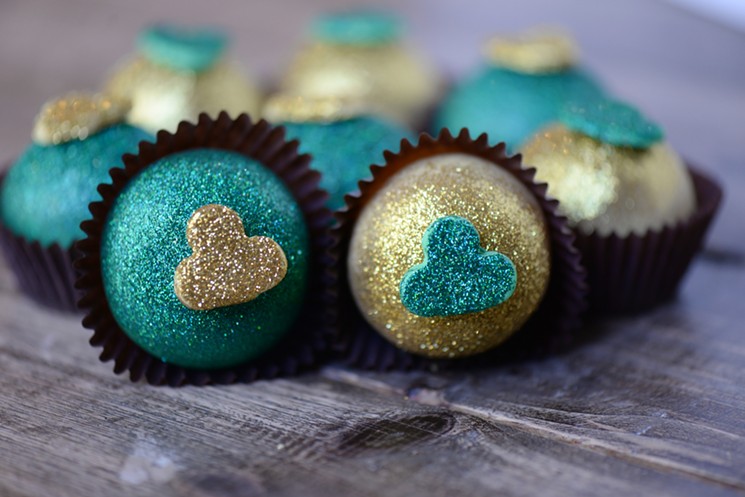 Get these sparkly green and gold cake truffles at Ooh La La. - PHOTO BY DRAGANA HARRIS