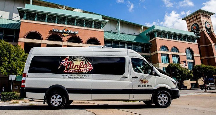 A free Ninfa's shuttle runs an hour before and after the game. - PHOTO BY KIRSTEN GILLIAM PHOTOGRAPHY