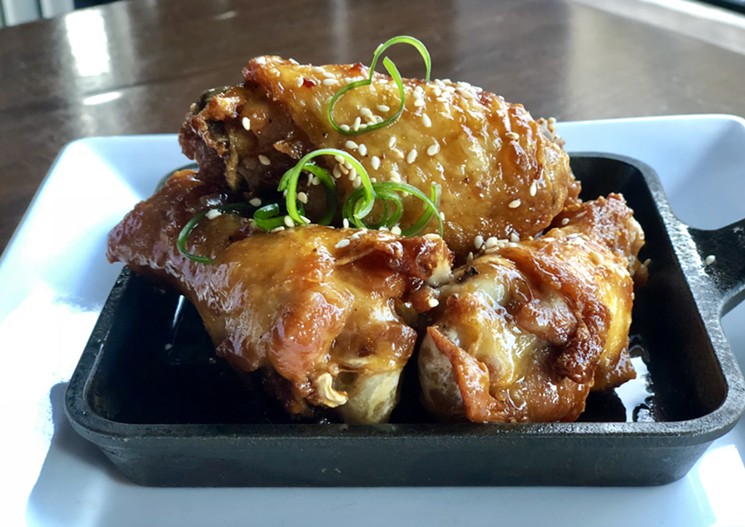 The Dr. Pepper Wings at Bosscat Kitchen + Libations are $6 during happy hour. - COURTESY OF BOSSCAT KITCHEN + LIBATIONS