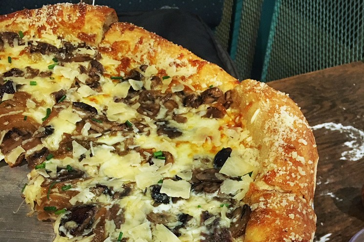 Check that parmesan-covered crust on Mellow Mushroom's namesake pizza. - PHOTO BY ERIKA KWEE