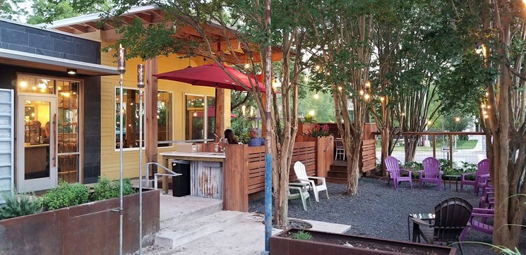 Plenty of space for pups and pals outdoors at Java Lava. - PHOTO COURTESY OF JAVA LAVA BREW