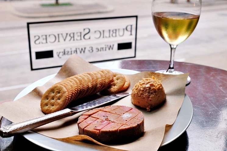 Sip aged wines alongside tasty snacks at Public Services Wine & Whisky. - PHOTO BY PHAEDRA COOK