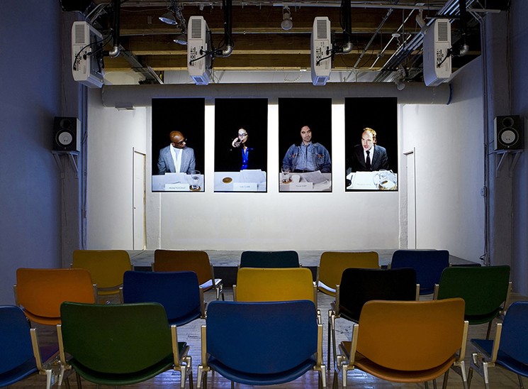Artist Mary Patten puts viewers in the hot seat as four actors reenact transcripts from a 1970s conference attended by French philosopher Michel Foucault (author of Discipline and Punish: The Birth of the Prison). Shown: Panel, 2013. - PHOTO COURTESY OF THE ARTIST