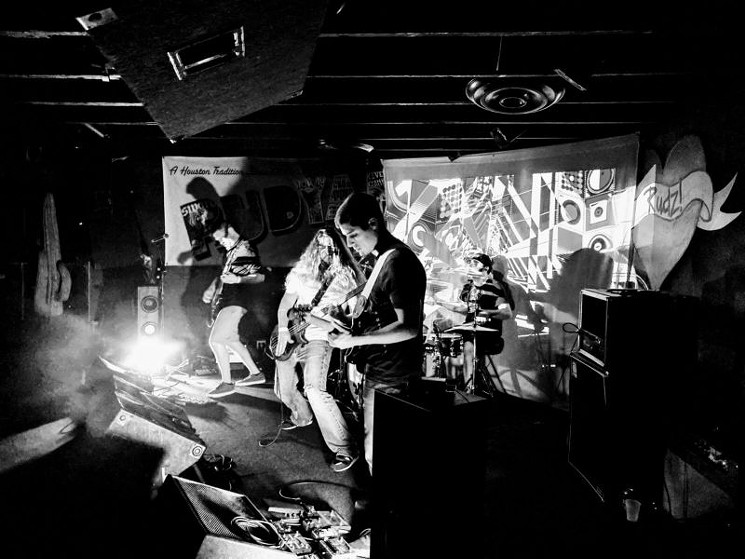 The band rips through a set at Rudz - PHOTO COURTESY OF ALONE ON THE MOON