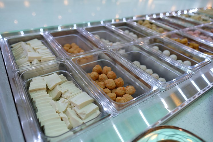 The buffet features a multitude of choices and plenty of fish balls. - PHOTO BY MAI PHAM
