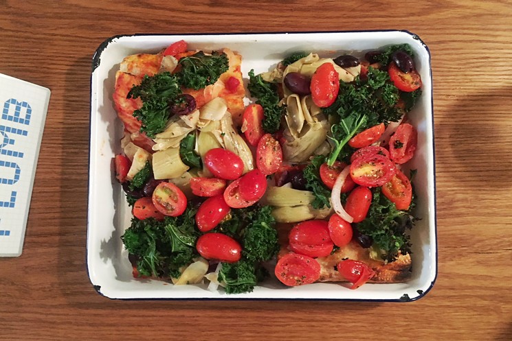 The personal veggie box pizza overflows with kale, tomatoes, artichoke hearts and olives. - PHOTO BY ERIKA KWEE