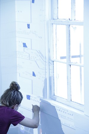 Artist Dawn Weleski working on "Noon at Night." - PHOTO COURTESY OF PROJECT ROW HOUSES