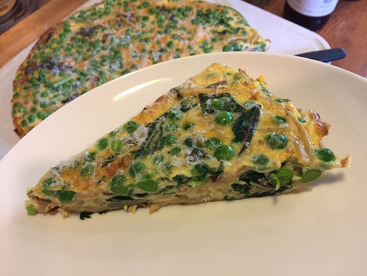 "Inception Frittata" with leftover carbonara and adders of onion, ham, parm and greens. - PHOTO BY NICHOLAS L. HALL