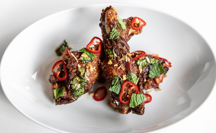 Crispy duck wings are a tasty and spicy snack at Miss Carousel. - PHOTO BY JULIE SOEFER PHOTOGRAPHY