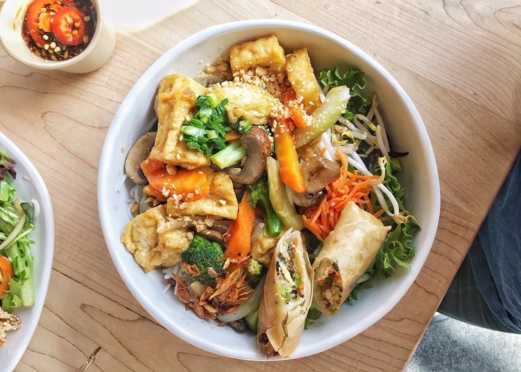 The tofu vermicelli bowl supplemented with a vegan egg roll. - PHOTO BY ERIKA KWEE