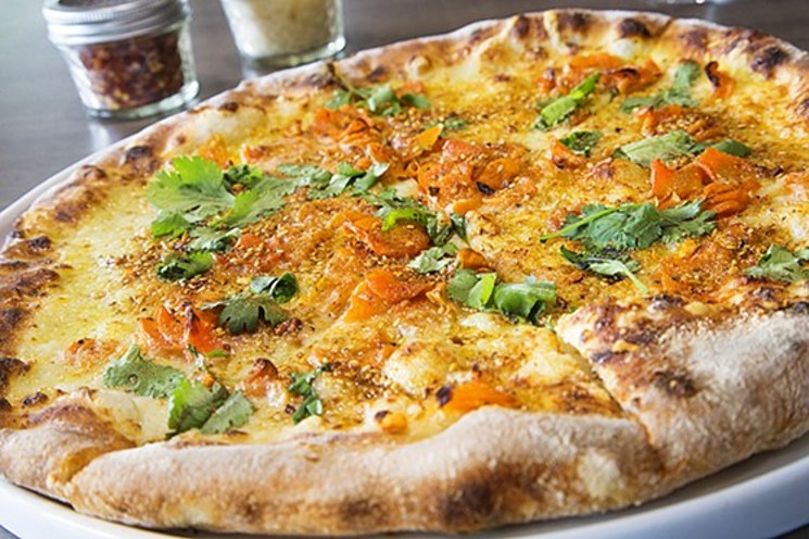 Weights + Measures' roasted carrot pizza would make any bruncher happy. - PHOTO BY TROY FIELDS