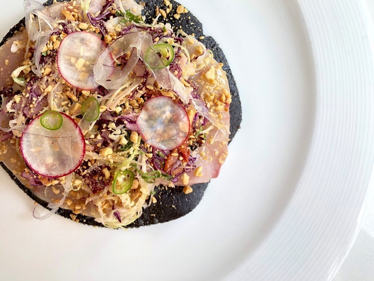 Chef Austin Simmons' Hamachi Crudo Tostado was one of  "The 13 Best Houston Dishes in 2018." See what else he has up his sleeve at the next collaborative dinner series. - PHOTO BY MAI PHAM