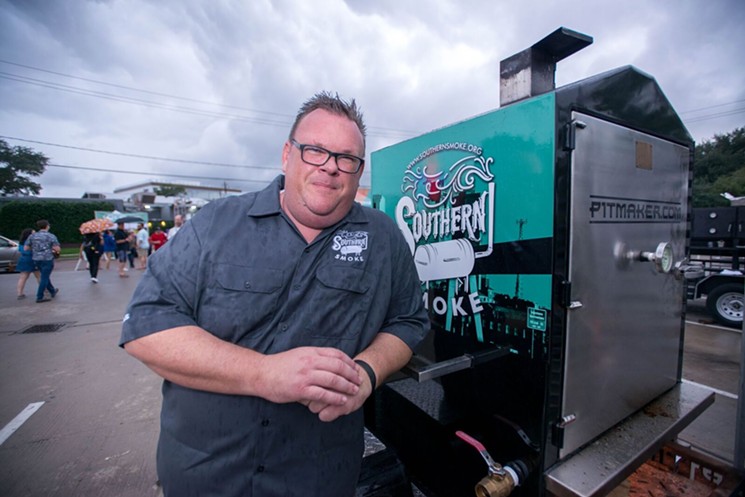 Chris Shepherd stands by his Pitmaker smoker. - PHOTO BY CATCHLIGHT PHOTOGRAPHY