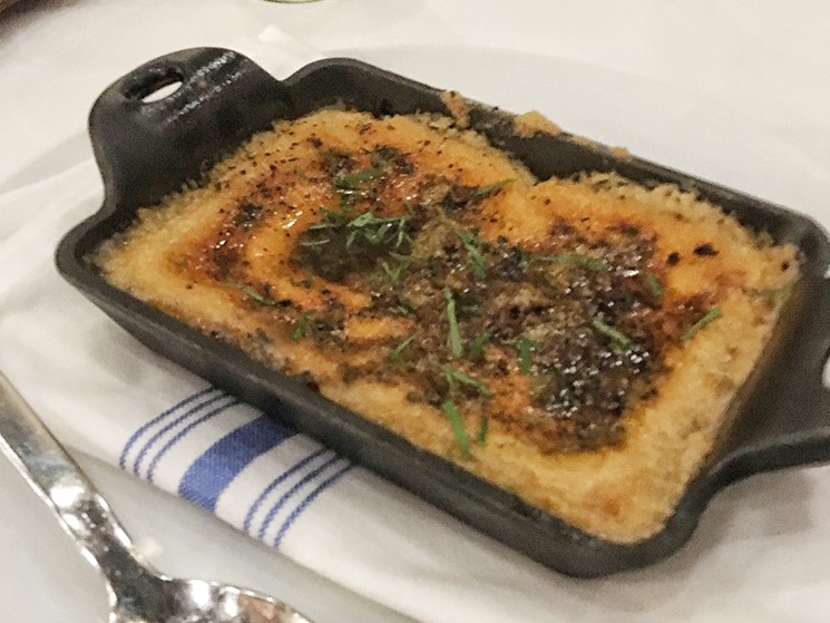 The Turkish hummus at One Fifth Mediterranean is served hot, drenched in garlic butter. - PHOTO BY ERIKA KWEE