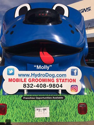 HydroDog's mobile grooming unit is named Molly. - PHOTO BY ELLEN KUO