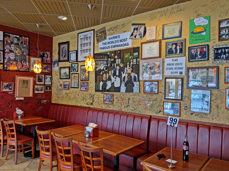 Though the original location was lost in a fire, the new Westchase location still feels like a Houston institution with decades of history on its walls. - PHOTO BY CARLOS BRANODN