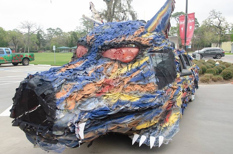 Students at St. Francis Episcopal School are howling with excitement to debut their first art car. - PHOTO BY MATT ZERINGUE
