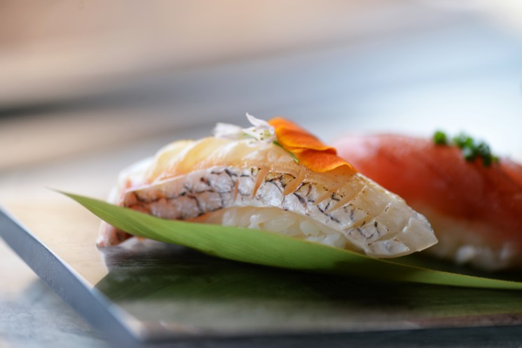 See what treasures await as chef Mike Lim opens the  Toyosu Fish Box at Tobiuo Sushi Bar. - PHOTO BY DRAGANA HARRIS