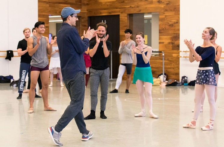 Choreographer Justin Peck with Artists of Houston Ballet rehearsing Reflections. - PHOTO BY LAWRENCE KNOX