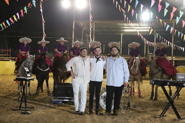 Camera Cult with their horse riding costars The Rebeldes on the set of the "Location" music video shoot. - PHOTO BY MIRIAM MIRELES
