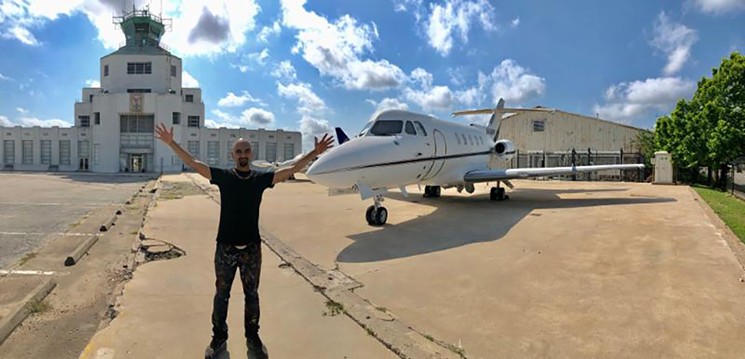 Mario Figueroa Jr. (GONZO247) has been busy all week painting this 1969 Hawker jet. - PHOTO BY AMY ROGERS