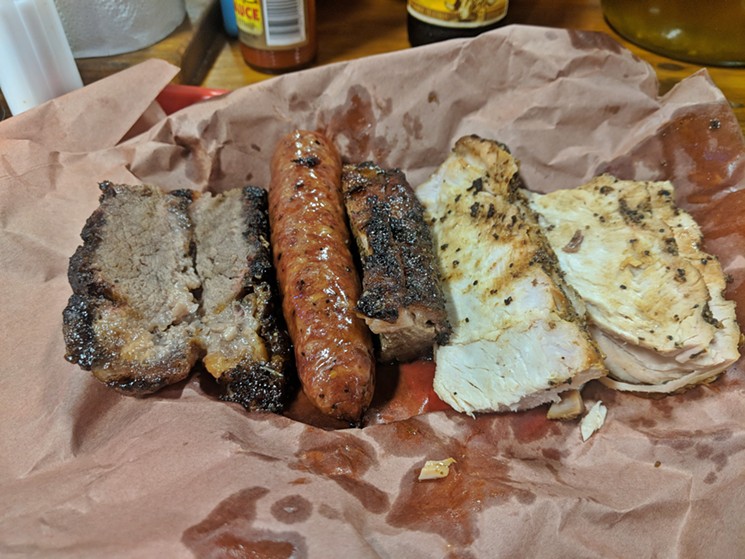Barbecue tray with brisket, sausage and turkey from Cooper's in New Braunfels. - PHOTO BY CARLOS BRANDON