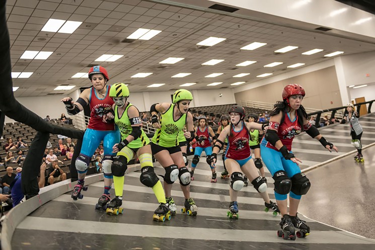 The Queens of Chaos battling the Bio Hazard Babes. - PHOTO BY BRIAN HART