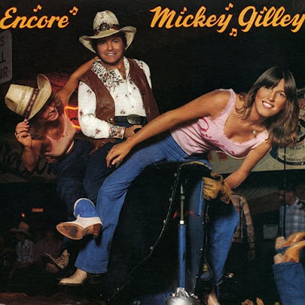 While Mickey Gilley originally did not want a mechanical bull in, it became the centerpiece of his club and his career. - EPIC RECORDS 1980 ALBUM COVER