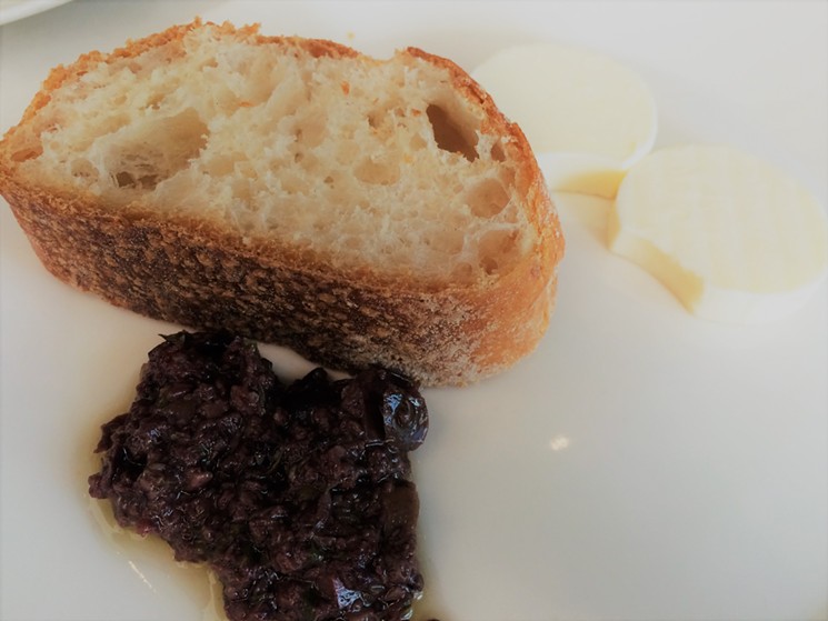 Bread with olive tapenade starts off  a delicious meal. - PHOTO BY LORRETTA RUGGIERO