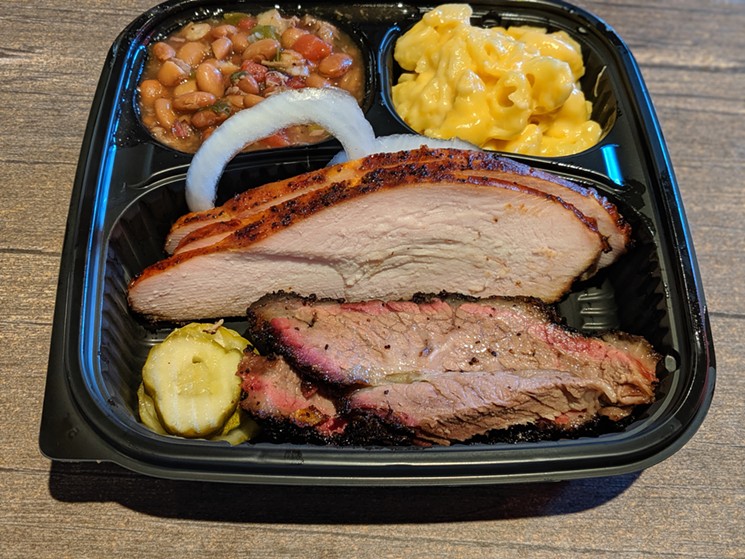 The brisket is tender and intensely flavored at True Texas BBQ inside the Kingwood H-E-B. - PHOTO BY CARLOS BRANDON