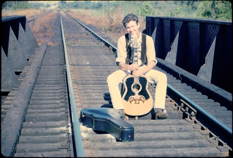Jerry Jeff Walker on railroad tracks circa 1965. It was around this time that he was arrested in New Orleans and met the character named Bojangles in jail, who inspired his best-known song "Mr. Bojangles." - PHOTO BY ANNE EDWARDS/COURTESY OF THE WITTLIFF COLLECTIONS AT TEXAS STATE UNIVERSITY