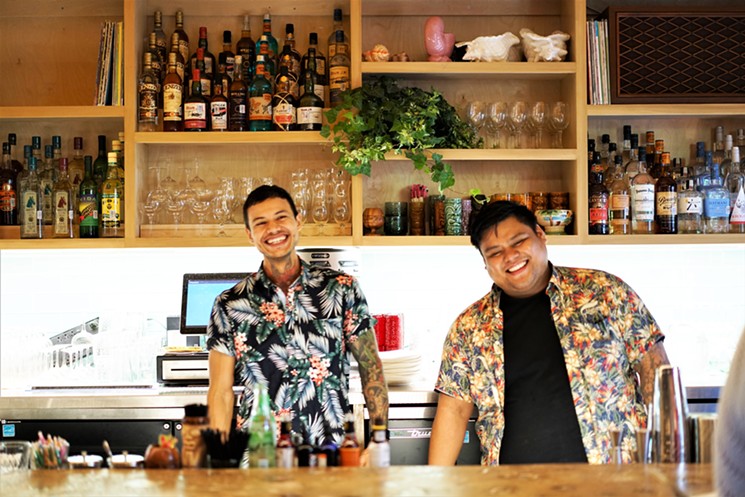 Have a couple of drinks and a couple of smiles at The Toasted Coconut. - PHOTO BY VIVIAN LEBA