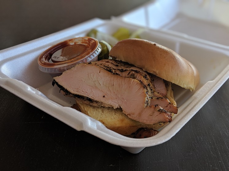 Smoked turkey is perfectly tender and goes well on a sandwich covered in sauce. - PHOTO BY CARLOS BRANDON