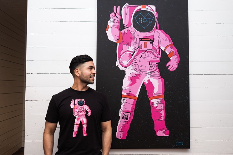 Donkeemom's beloved Pink Astonaut in painting and shirt form. - PHOTO BY FREDIS BENITEZ