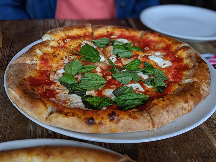 Chef Ryan Pera's classic Margherita style pizza on his signature raised crust. - PHOTO BY CARLOS BRANDON