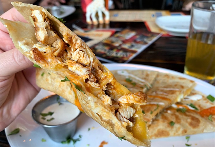 Skip the messy wings and try Beer Market's buffalo chicken quesadilla next time. - PHOTO BY BROOKE VIGGIANO