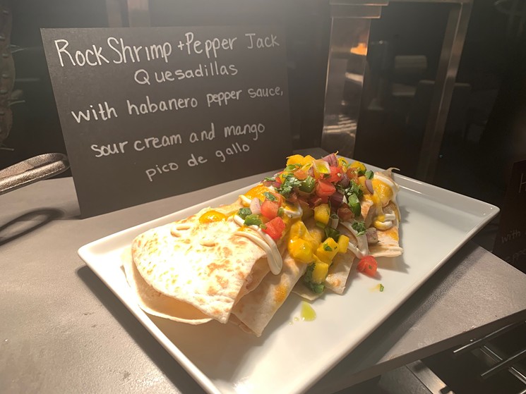 The rock shrimp quesadilla is a hands-on dish. - PHOTO BY TOYOTA CENTER