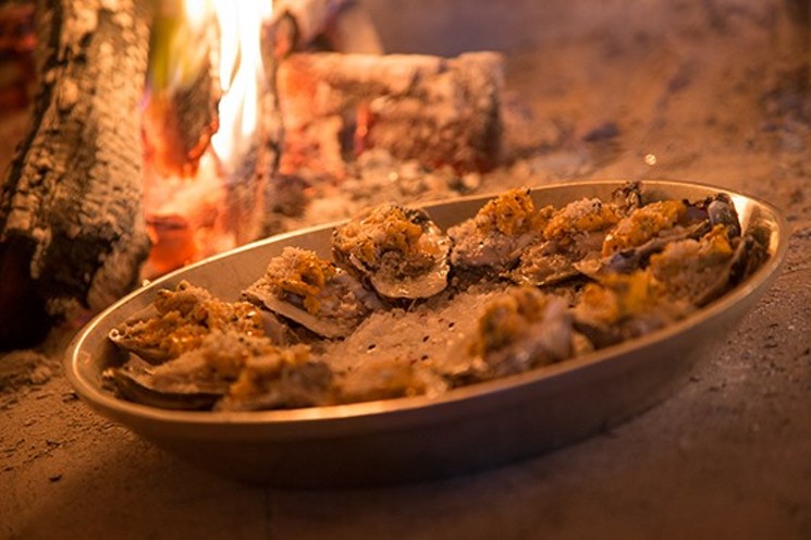 Enjoy wood-roasted oysters and Portuguese wines at a walk-around happy hour tasting at Caracol. - PHOTO BY TROY FIELDS