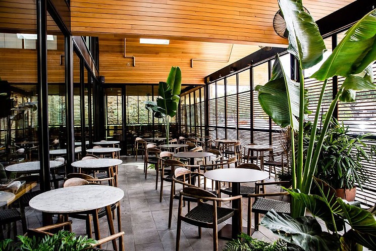 The patio at Traveler's Table is an oasis in a city of over-development. - PHOTO BY KIRSTEN GILLIAM