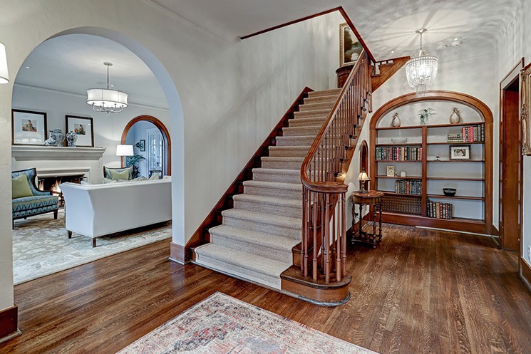 The arched mahogany doorways, built-ins and plaster walls retain their 1920s charm. - PHOTO BY TAD KRAMPITZ