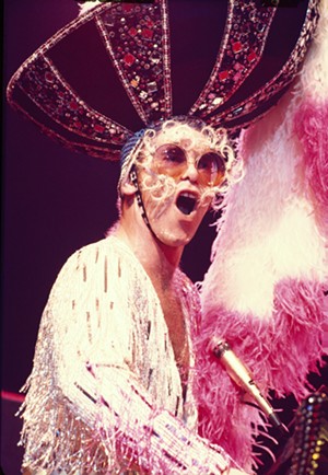 Always dressed in an understated manner: Elton performing in 1974. - PHOTO © SAM EMERSON (COURTESY OF ROCKET ENTERTAINMENT)
