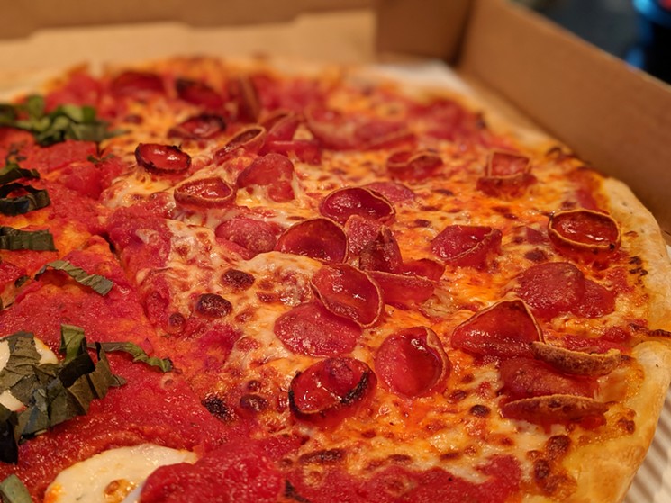 Pepperonis curl into small suction cups that crisp around the edges and crunch in your mouth. - PHOTO BY CARLOS BRANDON
